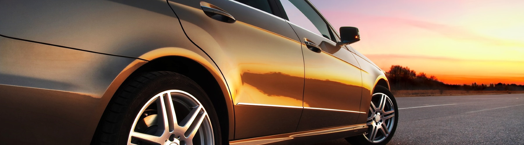 closeup of car on empty road